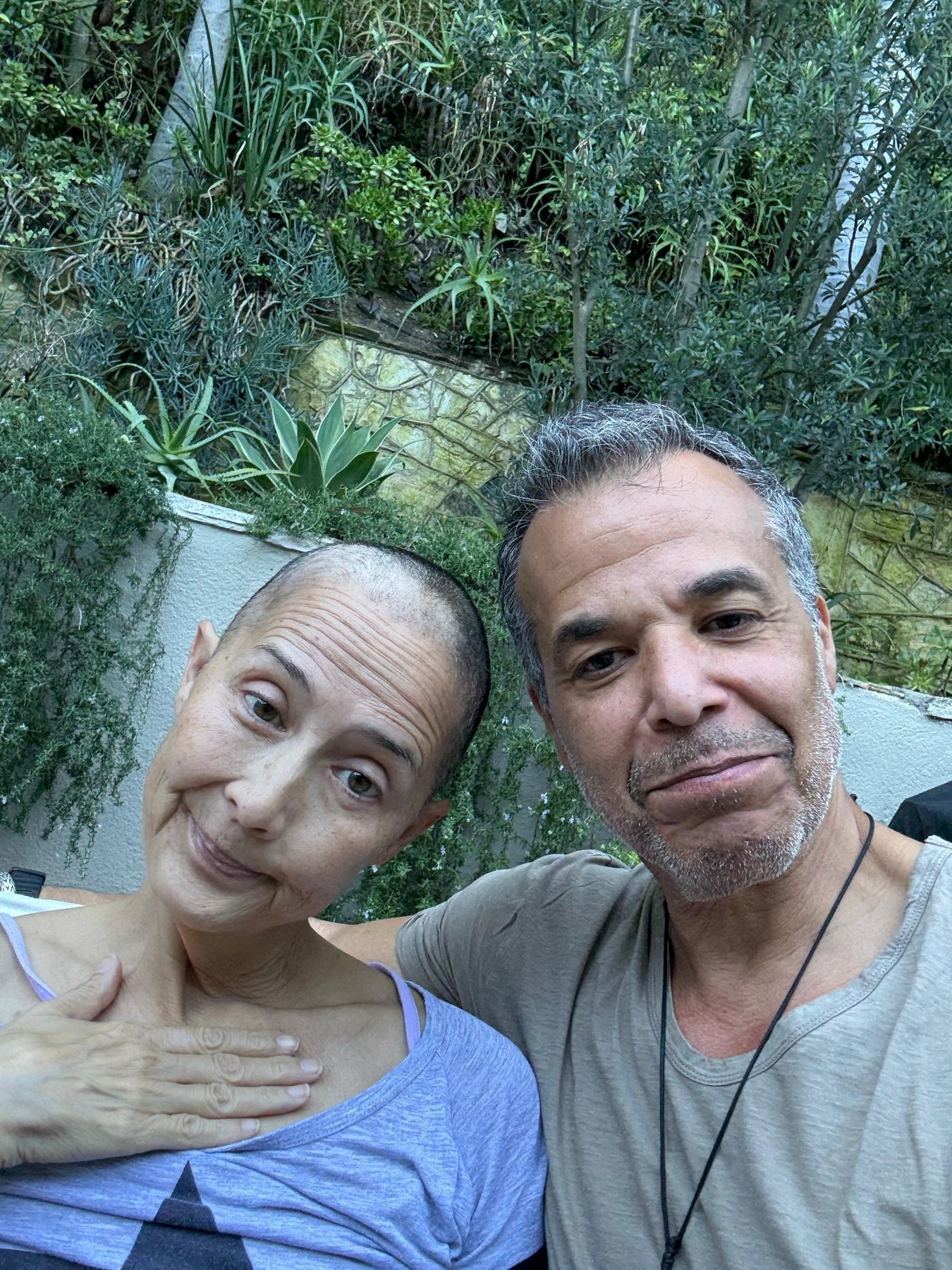 Lisa with Dan outdoors